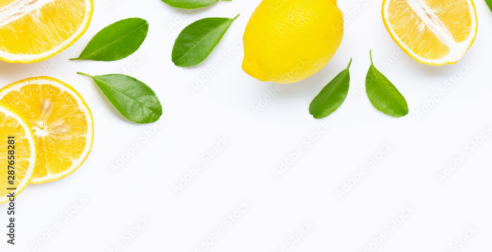 Frame made of fresh lemon and  slices with leaves isolated on white