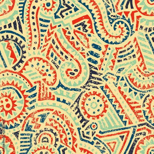Seamless tribal pattern. Ethnic and aztec motifs. Print for african textiles. Patchwork hand-drawn ornament. Grunge texture. Vector illustration.
