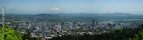Panoramic View Of Portland Skyline With Mount Rainier In The Background