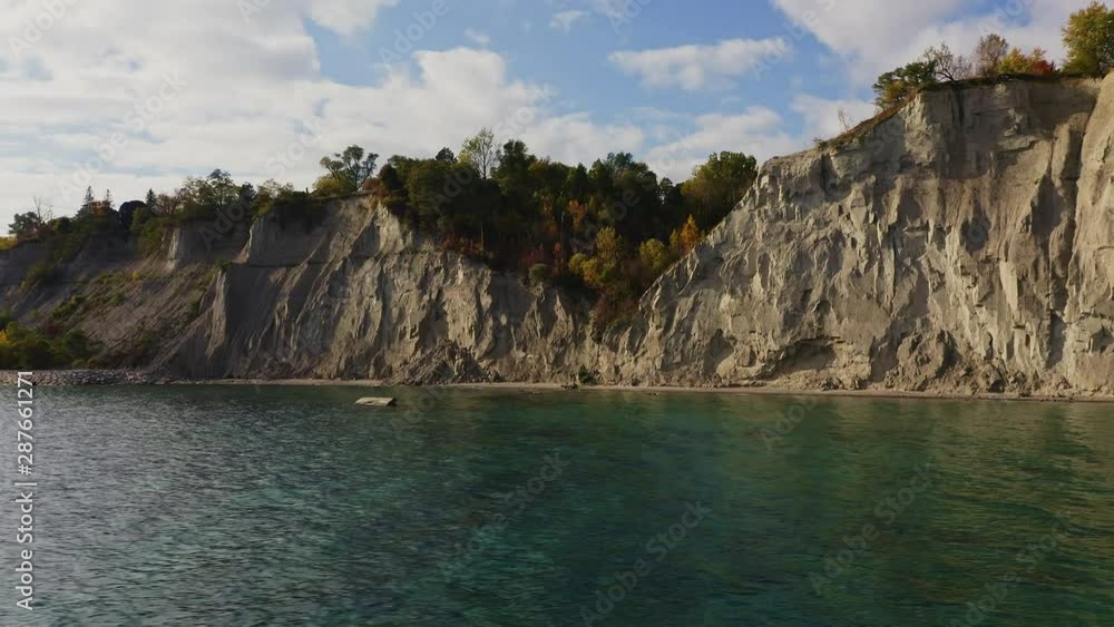 Aerial of Scarborough Bluffs flying over lake Ontario. DOLLY LEFT Aerial of Scarborough Bluffs flying over lake Ontario. DOLLY LEFT