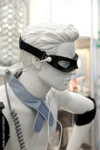 black eye patch, medical sensors and equipment on the mannequin. Modern treatment technologies photo