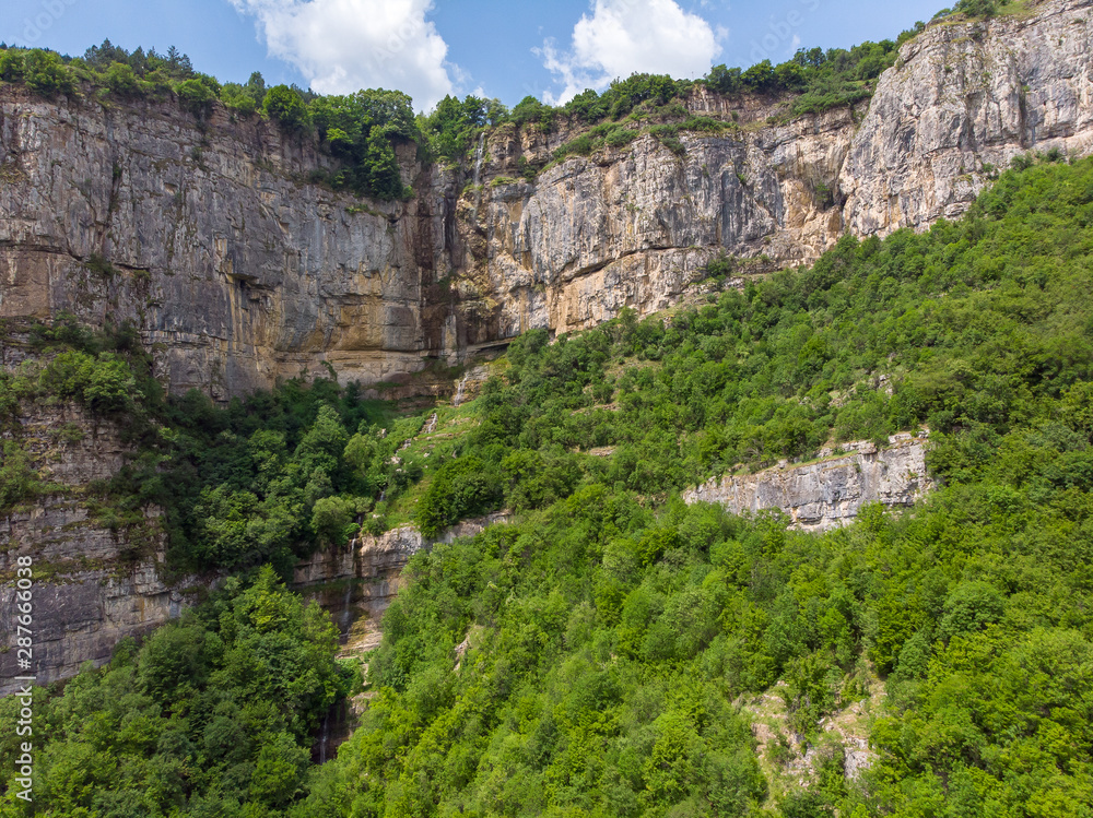 Waterfall in the rocks in Bulgaria. Vazova trail waterfall