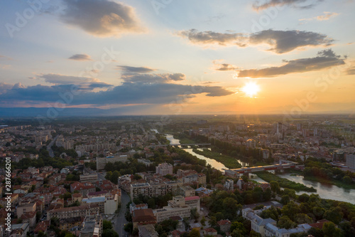Fototapeta Naklejka Na Ścianę i Meble -  Aerial view of Plovdiv with hills and Maritsa river during sunset