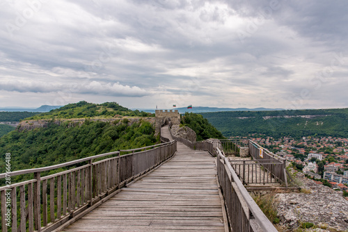 Fototapeta Naklejka Na Ścianę i Meble -  Ancient fortress on top of the mountain looking like Great China wall.