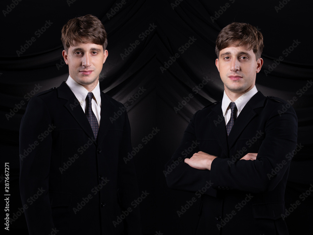 Portrait Caucasian Business man dark blue Formal proper Suit, studio lighting black drape fabric background, Lawyer Boss act posing smile smart look profile Portrait Caucasian Business man dark blue Formal proper Suit, studio lighting black drape fabric background, Lawyer Boss act posing smile smart look profile