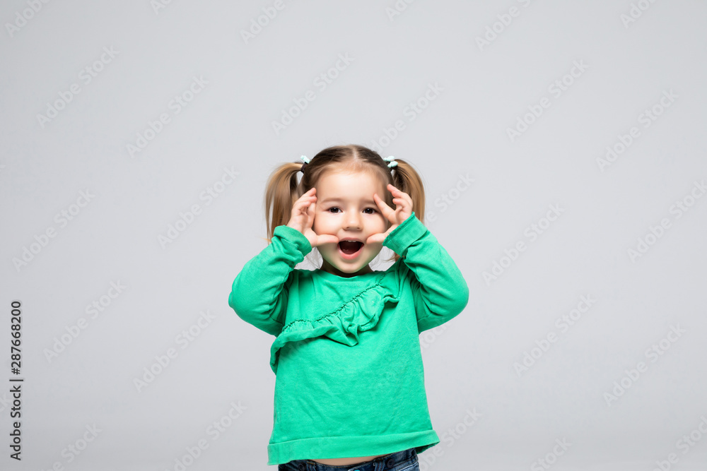 Cute little girl on a white background Cute little girl on a white background