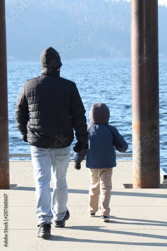 father and son on beach