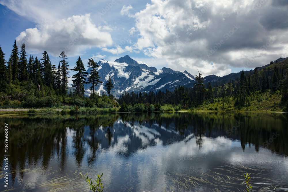 View of snow covered mountains from Picture Lake - Mount Baker National Forest Washington