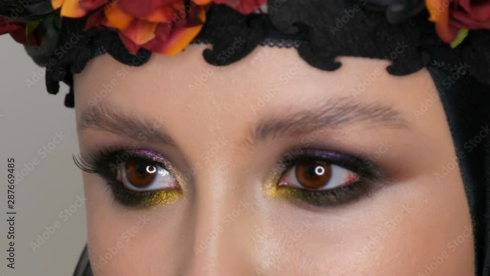 Professional girl model with beautiful makeup poses in a black cap and ...