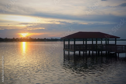 pier at sunset  sunset  sea  water  pier  sky  sunrise  landscape  jetty  travel  summer  evening  calm  wooden  dusk