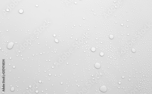 Water droplets on a gray background photo