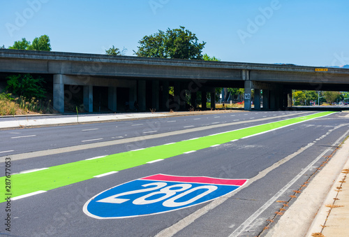 Canvas Print Route shield pavement marking in shape of familiar route shields guide travelers safely through unfamiliar interchange