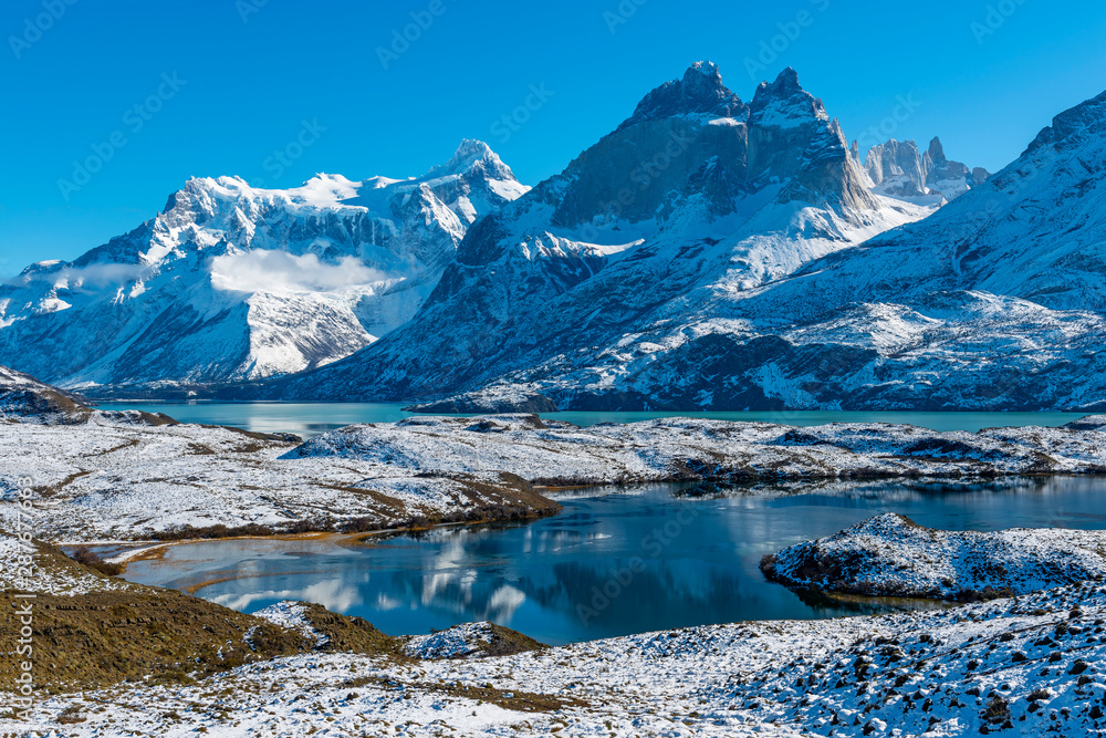The Cuernos del paine by Nordenskjold lake in winter, Patagonia, Chile. 