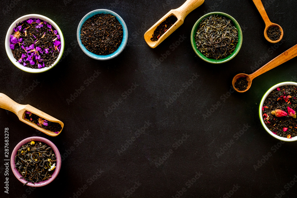 different tea for brew frame on black background top view space for text different tea for brew frame on black background top view space for text