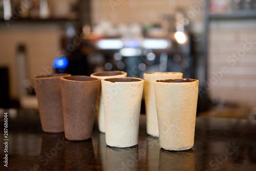 Wallpaper Mural Glasses for coffee on the table in the interiors of the bar. Torontodigital.ca