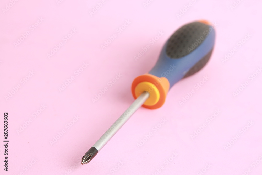 screwdriver tipped star, orange blue and black screwdriver tipped star, orange blue and black