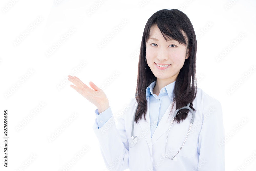 Young female doctor with stethoscope explaining isolated on white background Young female doctor with stethoscope explaining isolated on white background