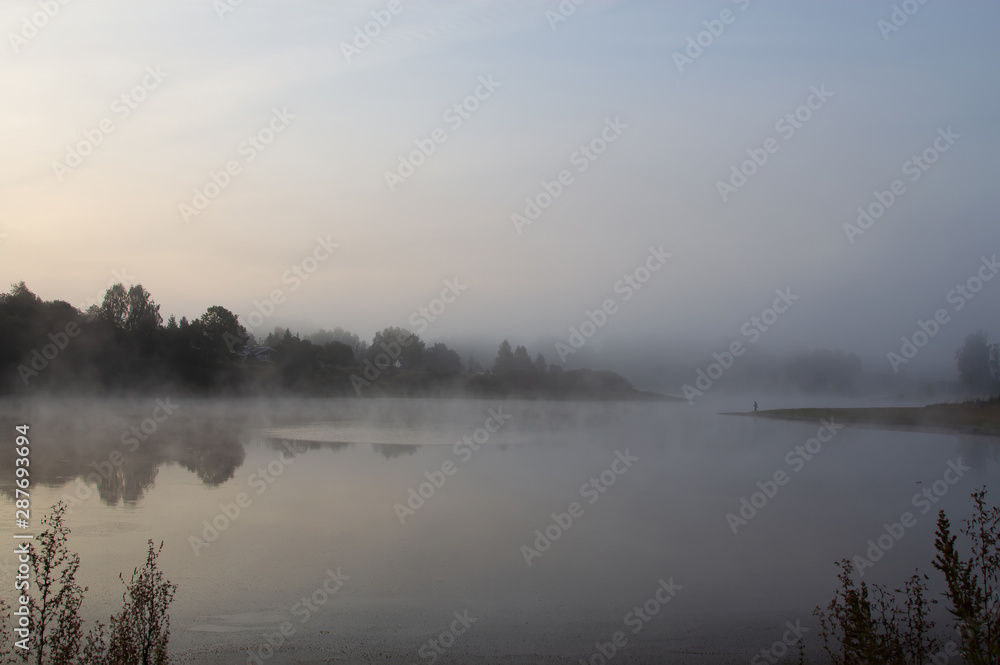 Misty September morning on the river. Dawn on the river. Misty September morning on the river. Dawn on the river.