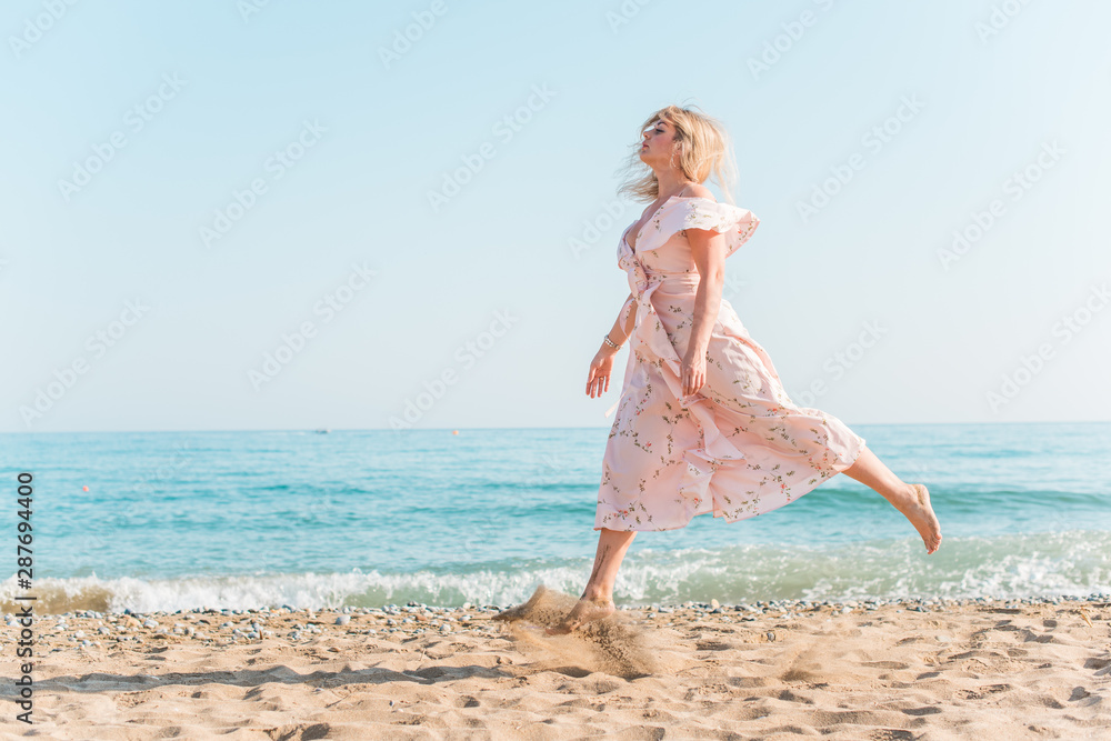 Plus size woman in holidays, Picturesque view of the beach, Location: Beach, Greece. Vacations and adventure concept Plus size woman in holidays, Picturesque view of the beach, Location: Beach, Greece. Vacations and adventure concept