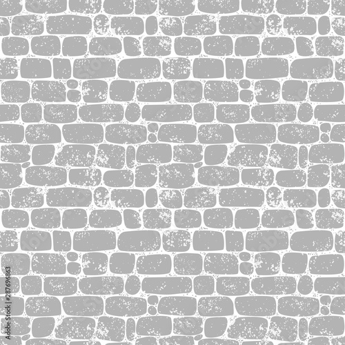 Seamless pattern. Wall of gray jagged stones. Texture for print, wallpaper, home decor, textile, package design, invitation or website background.