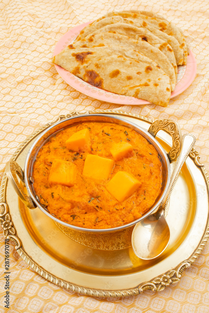 Indian Popular Vegetarian Cuisine Cheese Butter Masala Also Know as Cheese Cottage Curry or Paneer Butter Masala Served With Tandoori Roti Indian Popular Vegetarian Cuisine Cheese Butter Masala Also Know as Cheese Cottage Curry or Paneer Butter Masala Served With Tandoori Roti