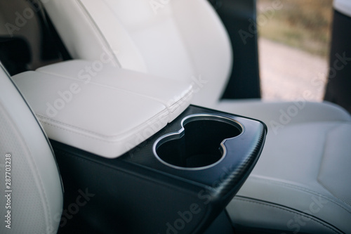 Cup holder for rear seats row