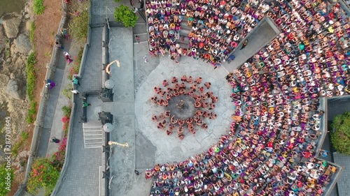 Uluwatu Kecak and Fire Dance performance at Bali amphitheatre, aerial view photo