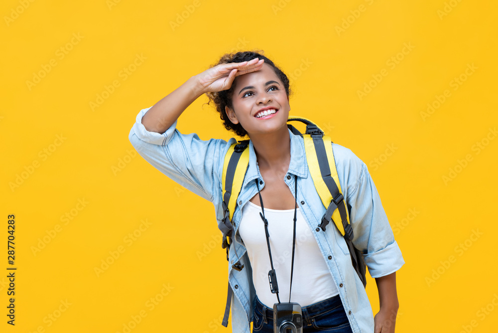 Woman tourist backpacker looking away with hand on forehead Woman tourist backpacker looking away with hand on forehead