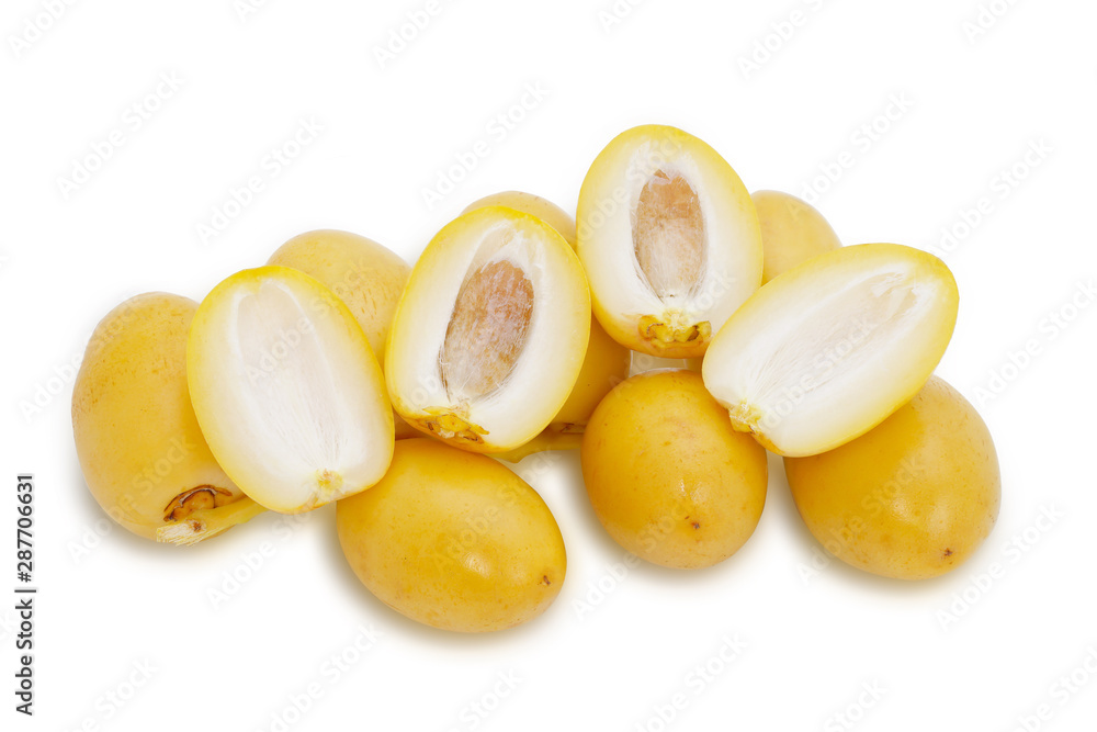Raw date palm sweet fruit isolated on white background. This has clipping path. Raw date palm sweet fruit isolated on white background. This has clipping path.