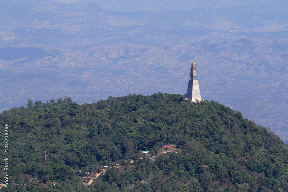 Pagoda in Buddhism on the mountain background,thailand Pagoda in Buddhism on the mountain background,thailand