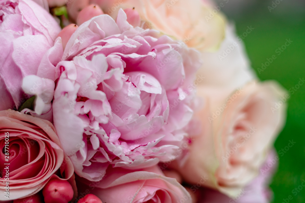 nice and beautiful wedding bouquet of flowers on green grass nice and beautiful wedding bouquet of flowers on green grass