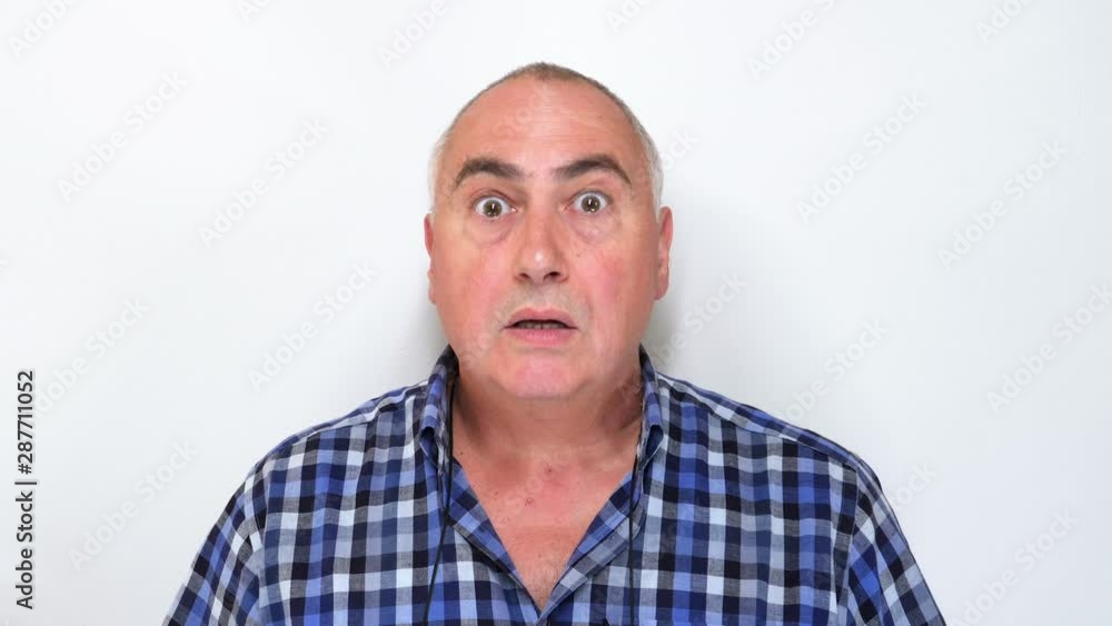 Amazed middle aged man surprised isolated on white background Amazed middle aged man surprised isolated on white background