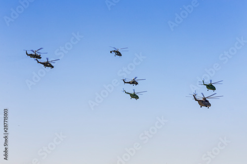 The flight of a group of military helicopters holding."Helicopters of Russia". MAKS 2019 in Zhukovsky. Russia