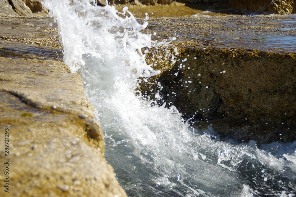 Sea waves on stone Sea waves on stone