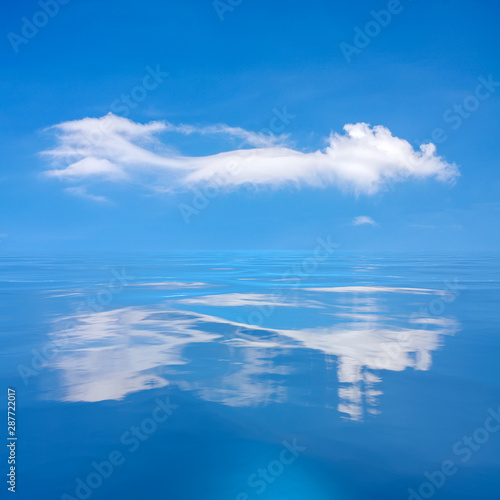blue sky with white cloud over the sea