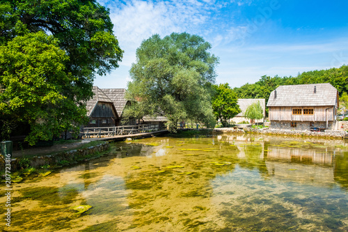 Croatia, region of Lika, Majerovo vrilo river source of Gacka, traditional village, old wooden mills and cottages