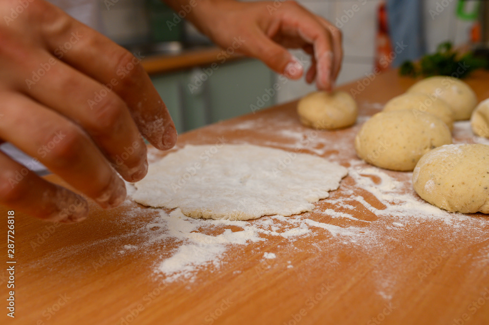 man preparing dough with flour man preparing dough with flour