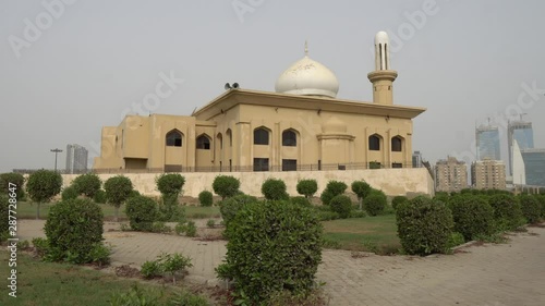 Karachi Bagh Ibn e Qasim Park Ashrafi Masjid Mosque Side View with Clipped Hedges on a Cloudy Day photo