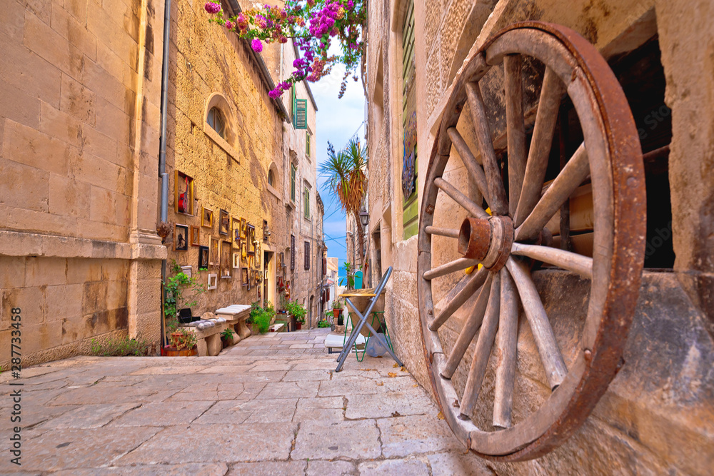 Town of Korcula steep narrow stone street colorful view
