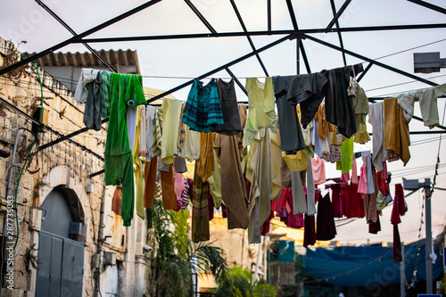 Laundry hanging on clothesline outside.