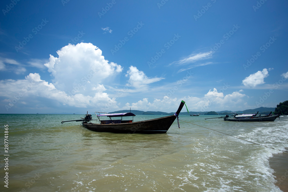 Ao Nang Beach with traditional longtail boats, Krabi, Thailand.