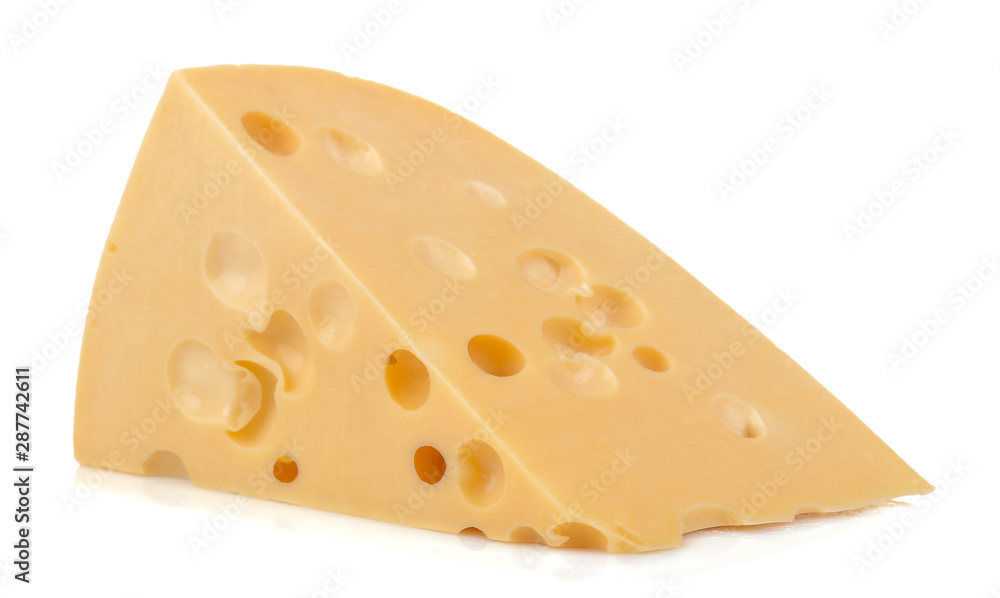 Slice of tasty Maasdam cheese with large holes on a white isolated background. close-up Slice of tasty Maasdam cheese with large holes on a white isolated background. close-up