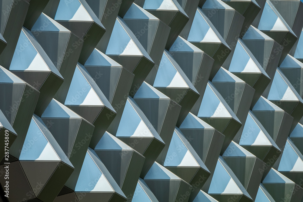 Close-up photo of technological metal structure. Abstract background image on the subject of modern architecture, industry or technology.