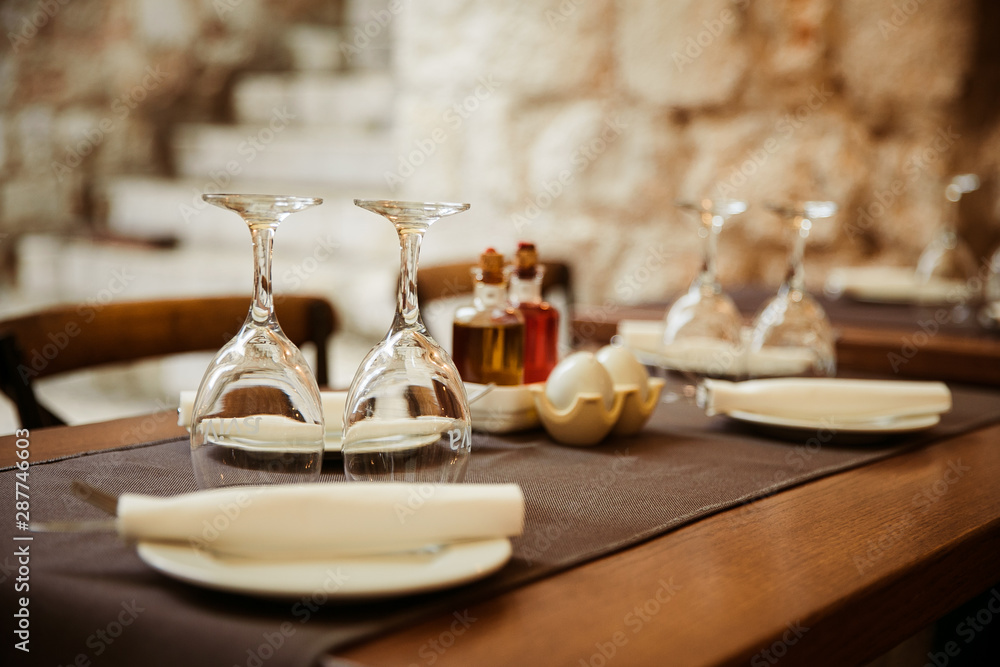 glasses on the table of one of the restaurants in bari