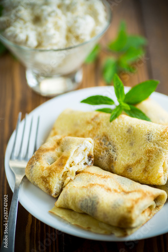 sweet fried thin pancakes with cottage cheese inside