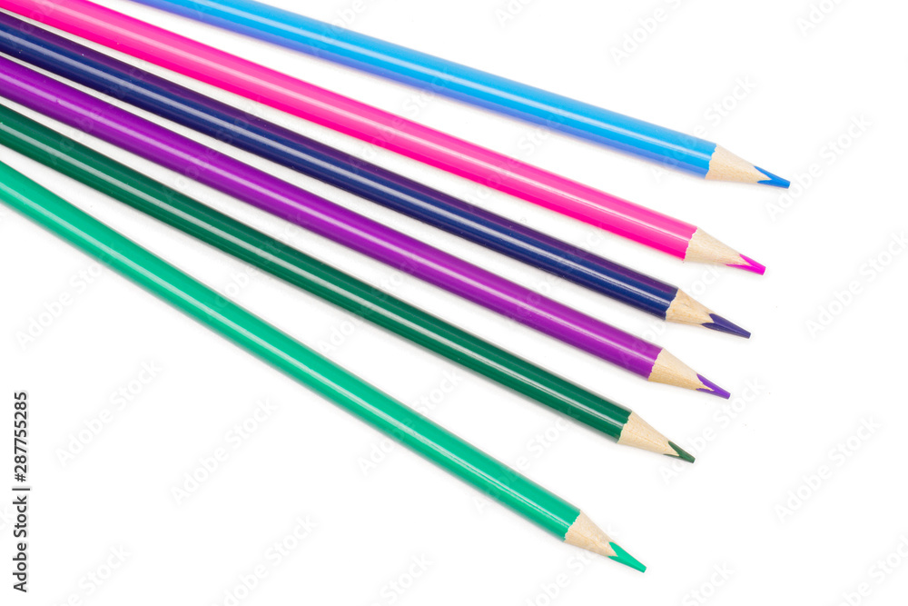 Fototapeta premium Group of six whole colored pencil cold gamma flatlay isolated on white background