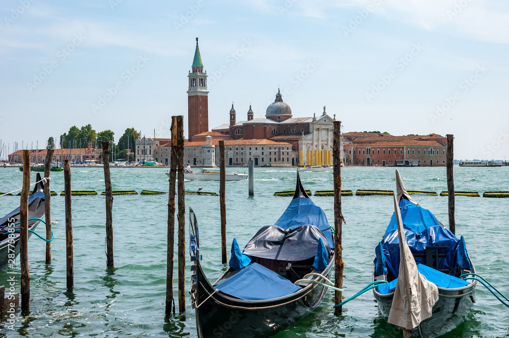Venice, the city of the lagoon, of the canals, and of carnival masks. Famous throughout the world as one of the most beautiful and romantic cities. Gondola and gondolier..