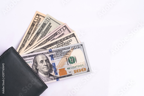Cash of  dollar note, dollar background. Lot of one hundred dollar bills close-up. dollars in  wallet on white background