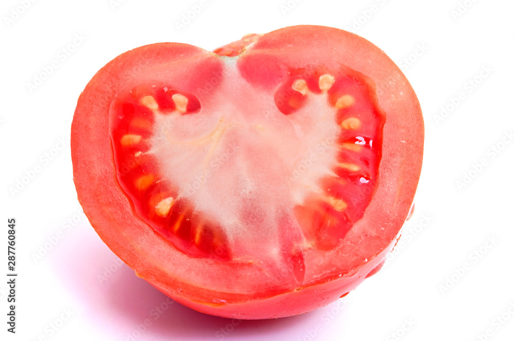 Red tomato against white isolated background Red tomato against white isolated background