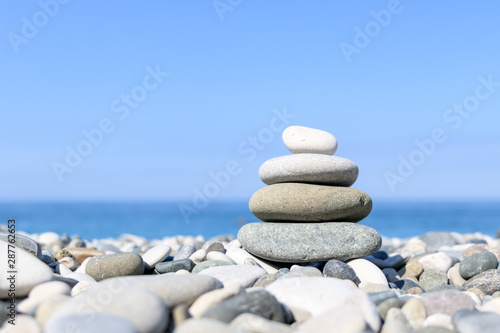 balance of stones on the background of the sea on the pebble plan  the concept of harmony and relaxation
